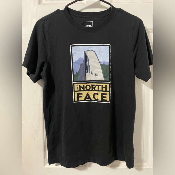Just a black Northface shirt with the mountain in the front. - Picture 1 of 3